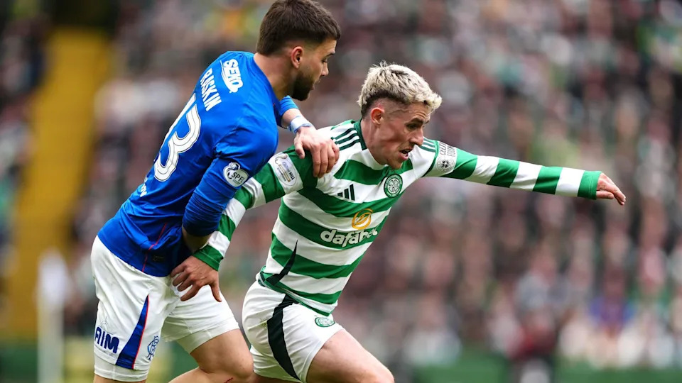 Rangers' Nicolas Raskin and Celtic's Luke McCowan battle for the ball