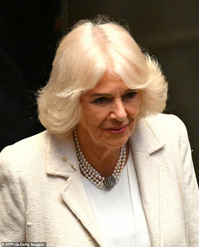 For her 20th wedding anniversary, Camilla re-wore her civil ceremony dress, accessorised with her signature four-strand pearl choker - a frequent choice for daytime events