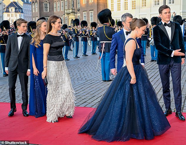 The birthday girl looked stunning in a sparkling navy dress, which featured an elegant puffed skirt