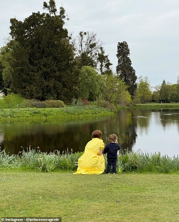 Princes Eugenie and her youngest son Ernest, two, peer out onto a lake in a picture posted to Instagram to mark Easter Sunday