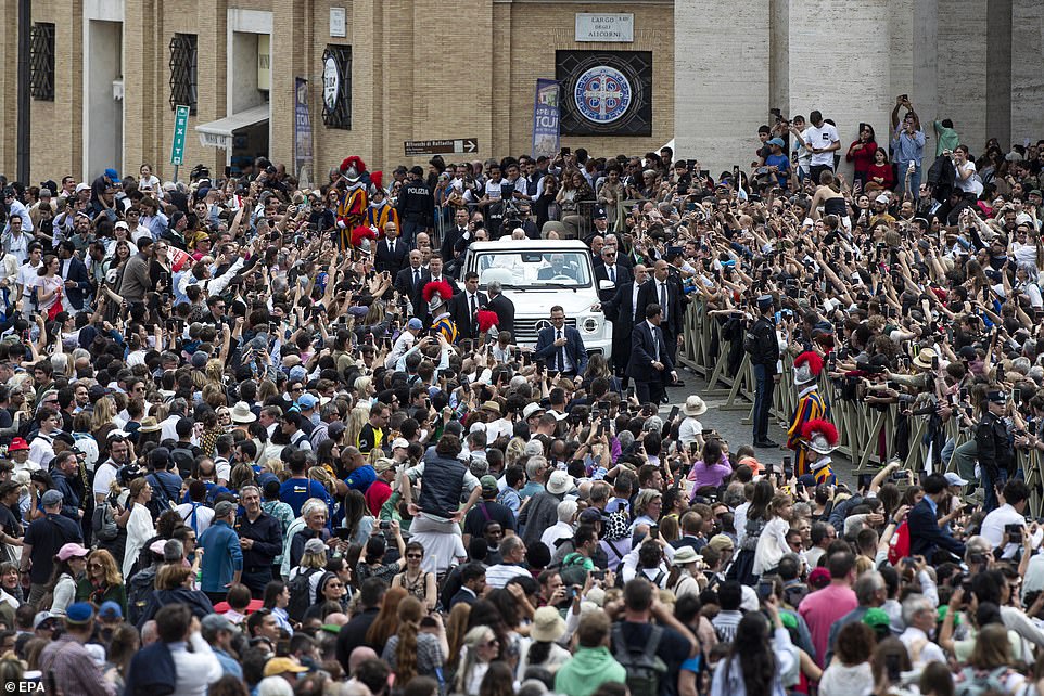 Thousands of faithful gathered under hazy skies in the sprawling plaza decorated with brightly-coloured tulips yesterday, hoping to catch a glimpse of the pontiff on what turned out to be his last appearance before his death was announced today