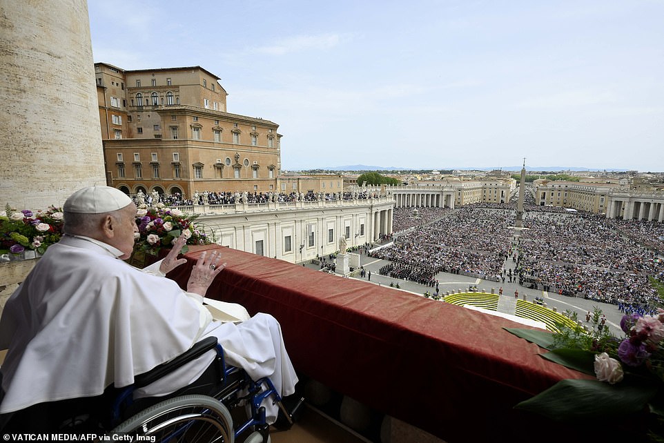 Pope Francis at the main balcony of St Peter's basilica during the Urbi et Orbi message and blessing to the city and the world as part of Easter celebrations