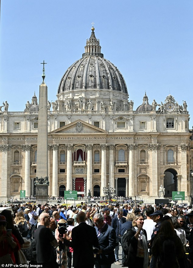 Large crowds gather at St Peter's square following the death of Pope Francis on April 21, 2025
