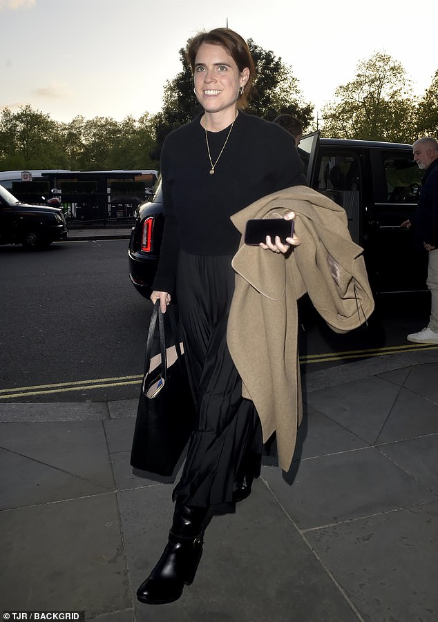 Princess Eugenie, 35, looked equally chic in monochrome, albeit her look depicted a more laid back fit