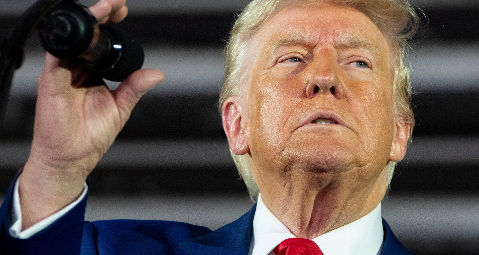 Fact-checking Trump’s claims at 100-day rally in Michigan | Donald Trump News