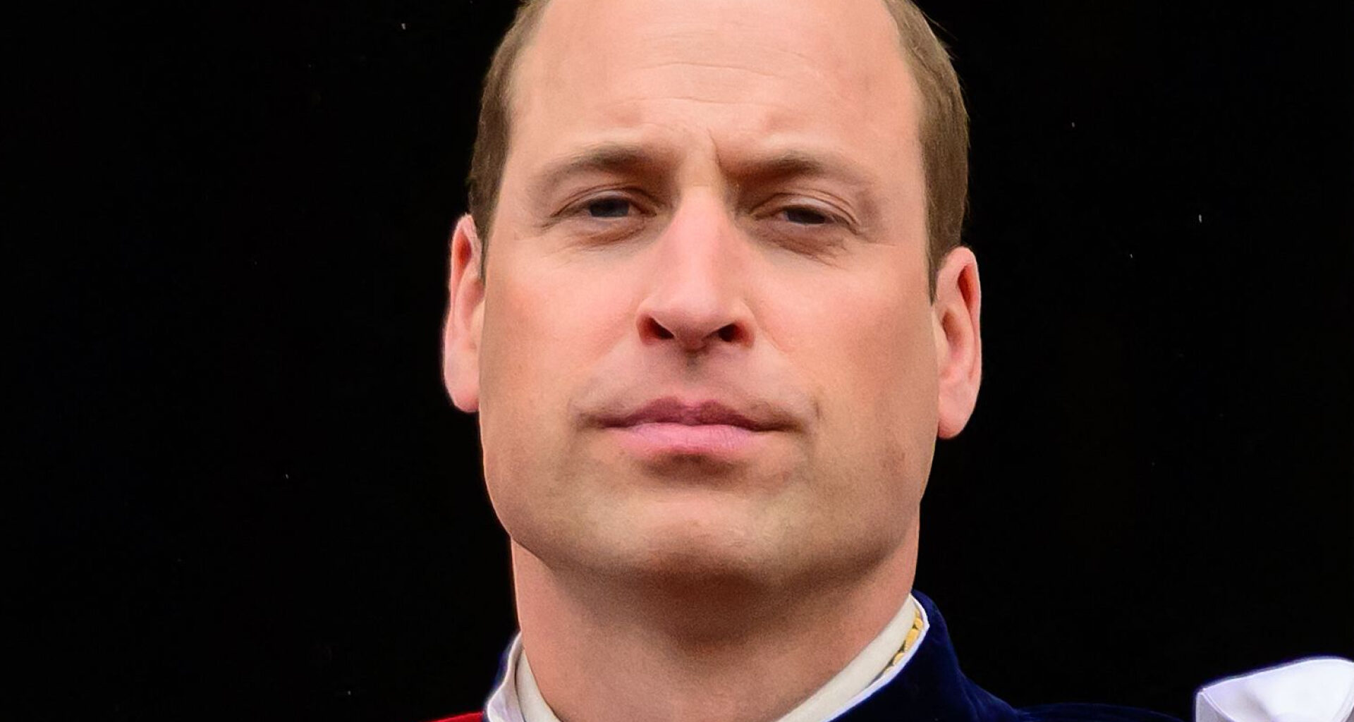 Prince William stares at the camera