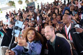 Prince William taking selfies with fans