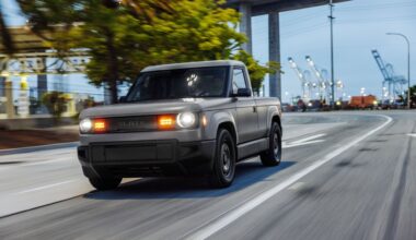 Slate Auto's new Slate Truck driving on a road.