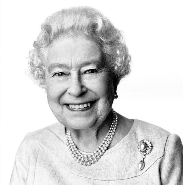 Elizabeth II wearing The Duchess of Cambridge's Pearl Pendant Brooch.