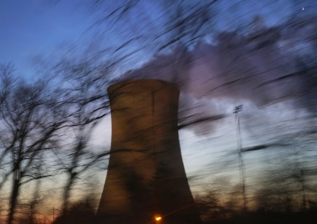 This March 4, 2017 file photo shows a hyperboloid cooling tower at the NIPSCO Michigan City Generating Station, a coal- and natural gas-fired power plant, which is set to close by 2028. (Michael Zajakowski / Chicago Tribune)