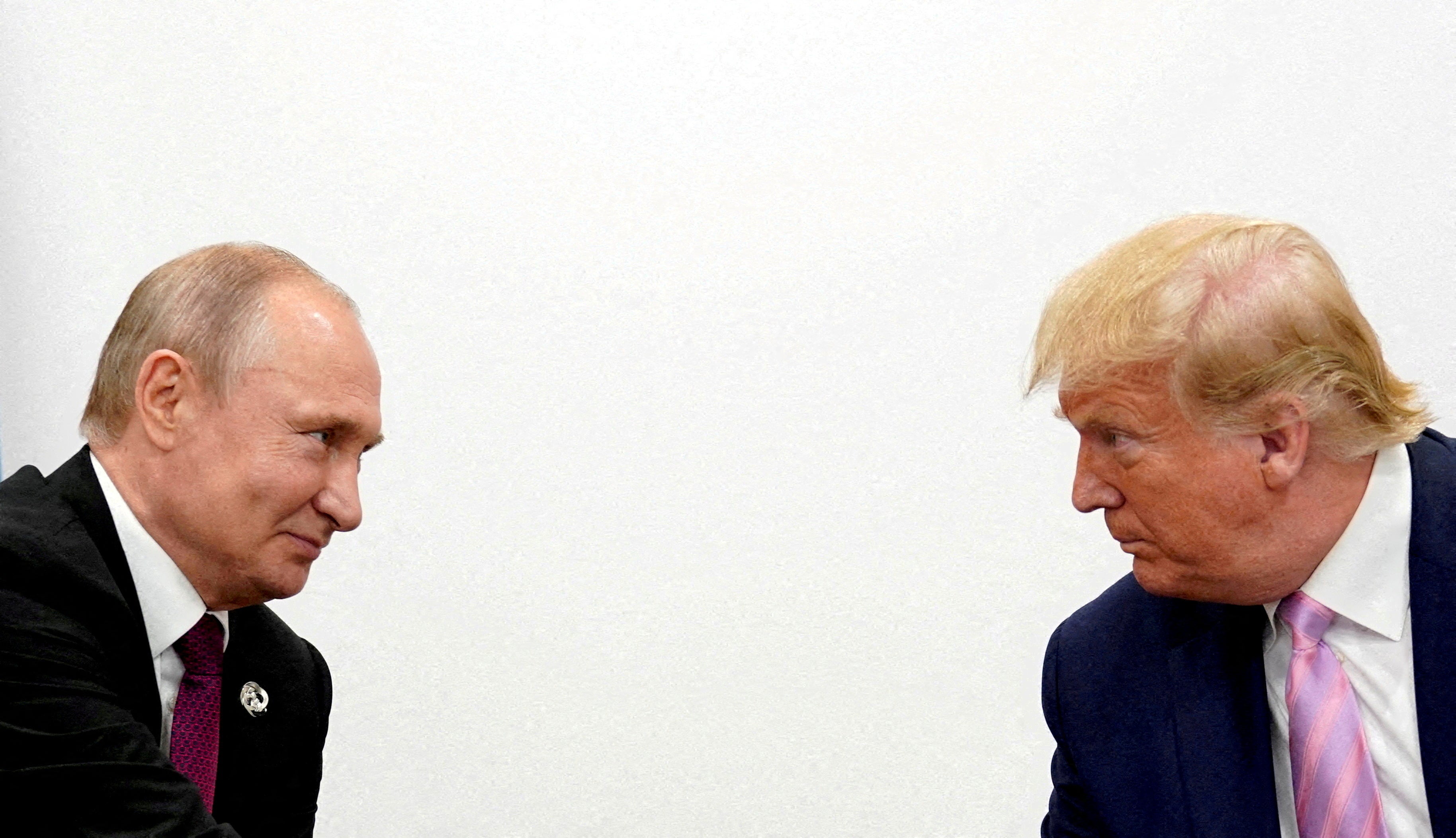 Donald Trump and Vladimir Putin hold a bilateral meeting at the G20 leaders summit in Osaka, Japan, 28 June 2019