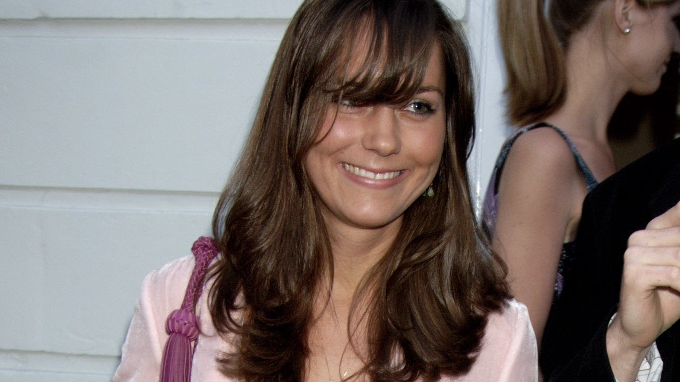 Kate Middleton smiles as she attends a party at Bluebird to celebrate The Shop at Bluebird in 2006