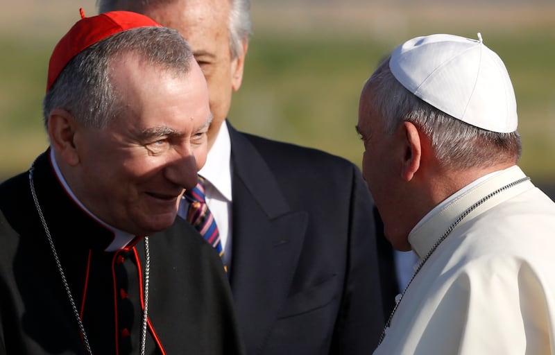 Pope Francis greets Vatican Secretary of State Monsignor Pietro Parolin (Riccardo De Luca/AP)