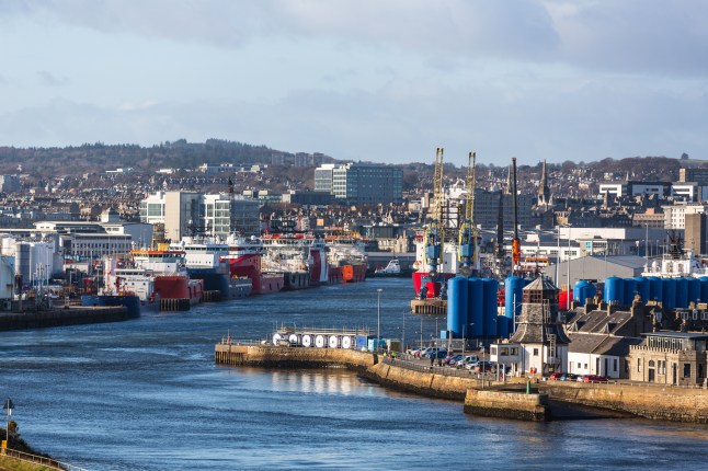 Oil rig support boats moored in the Port of Aberdeen, Scotland UK