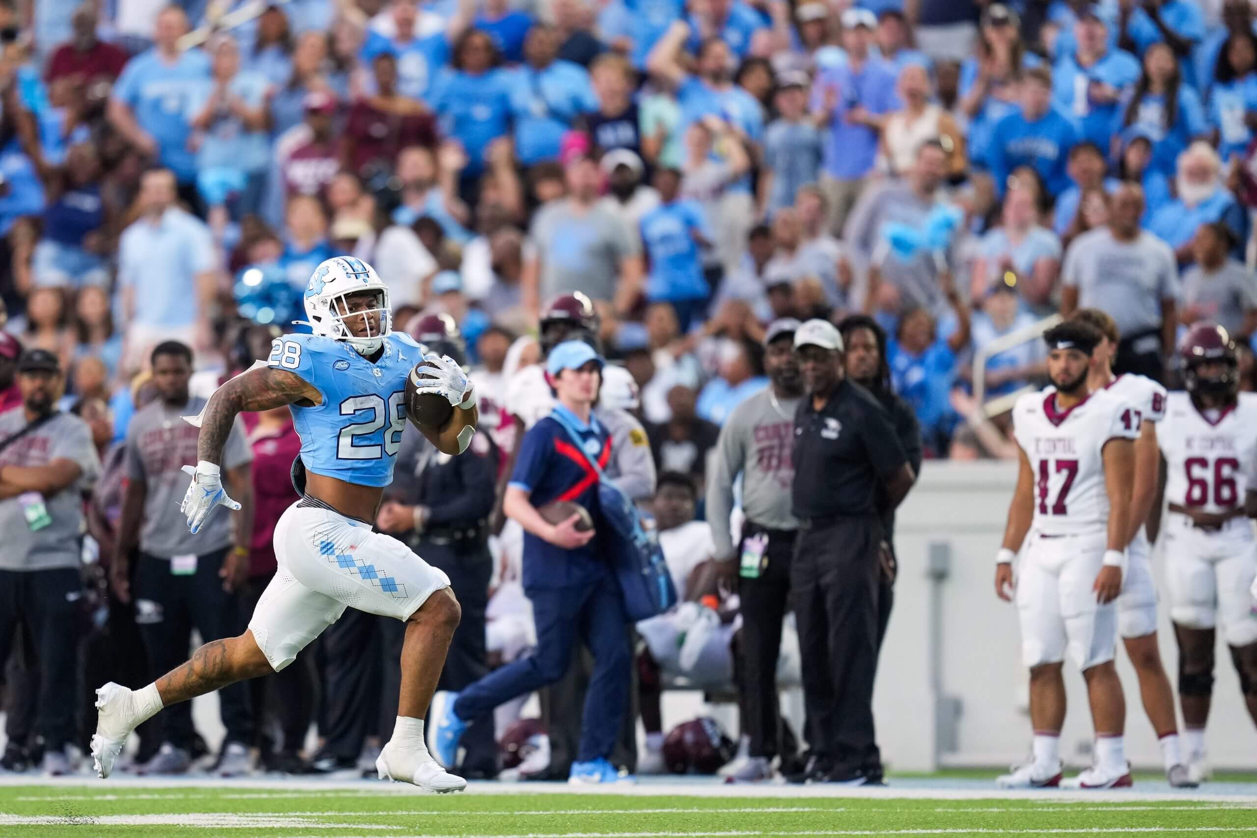 Omarion Hampton of the North Carolina Tar Heels breaks free for a long gain against the North Carolina Central Eagles during the first half of the game at Kenan Memorial Stadium on September 14, 2024 in Chapel Hill, North Carolina.
