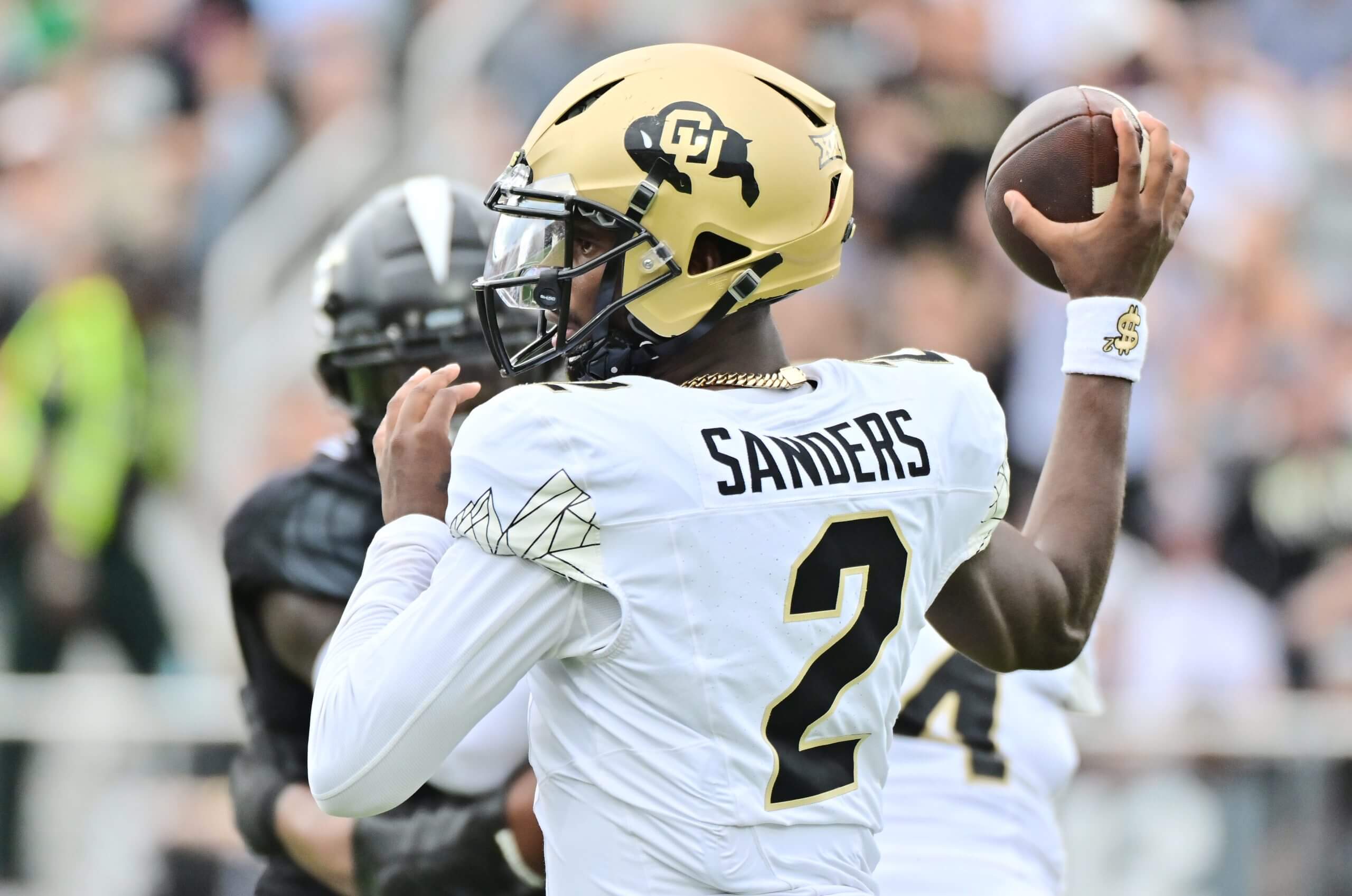 Shedeur Sanders of the Colorado Buffaloes drops back to throw a pass in the first quarter against the UCF Knights at FBC Mortgage Stadium on September 28, 2024 in Orlando, Florida.