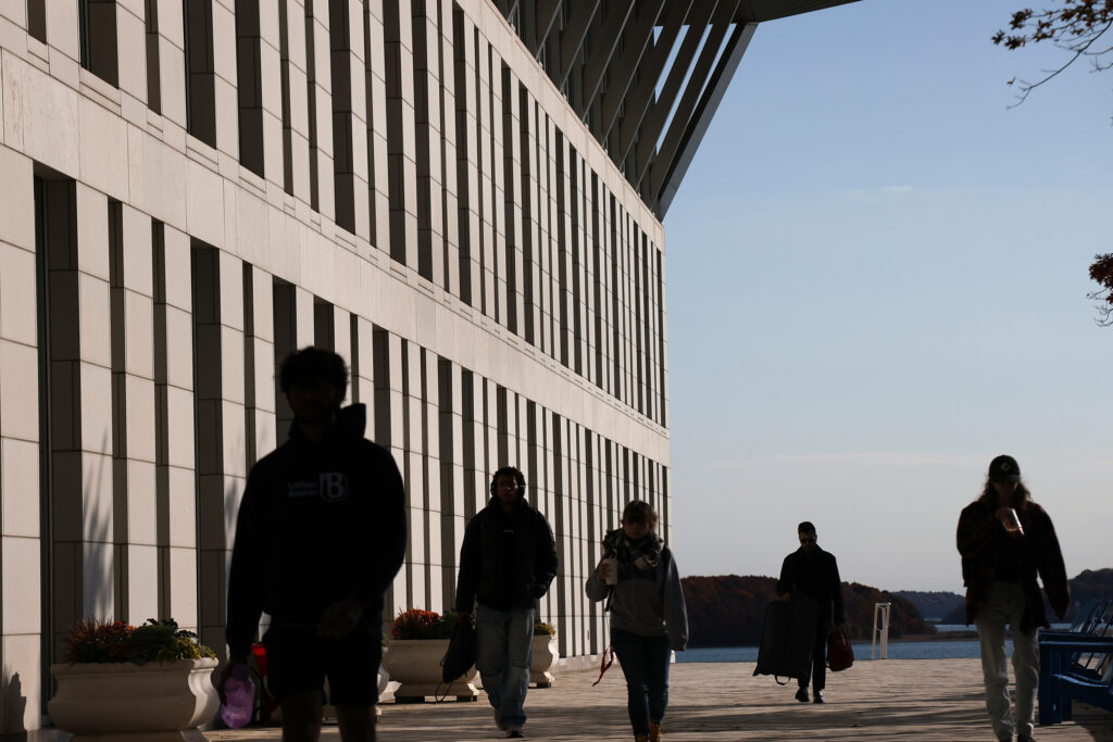 Students walk through the campus of UMass Boston. Credit: Suzanne Kreiter/The Boston Globe via Getty Images