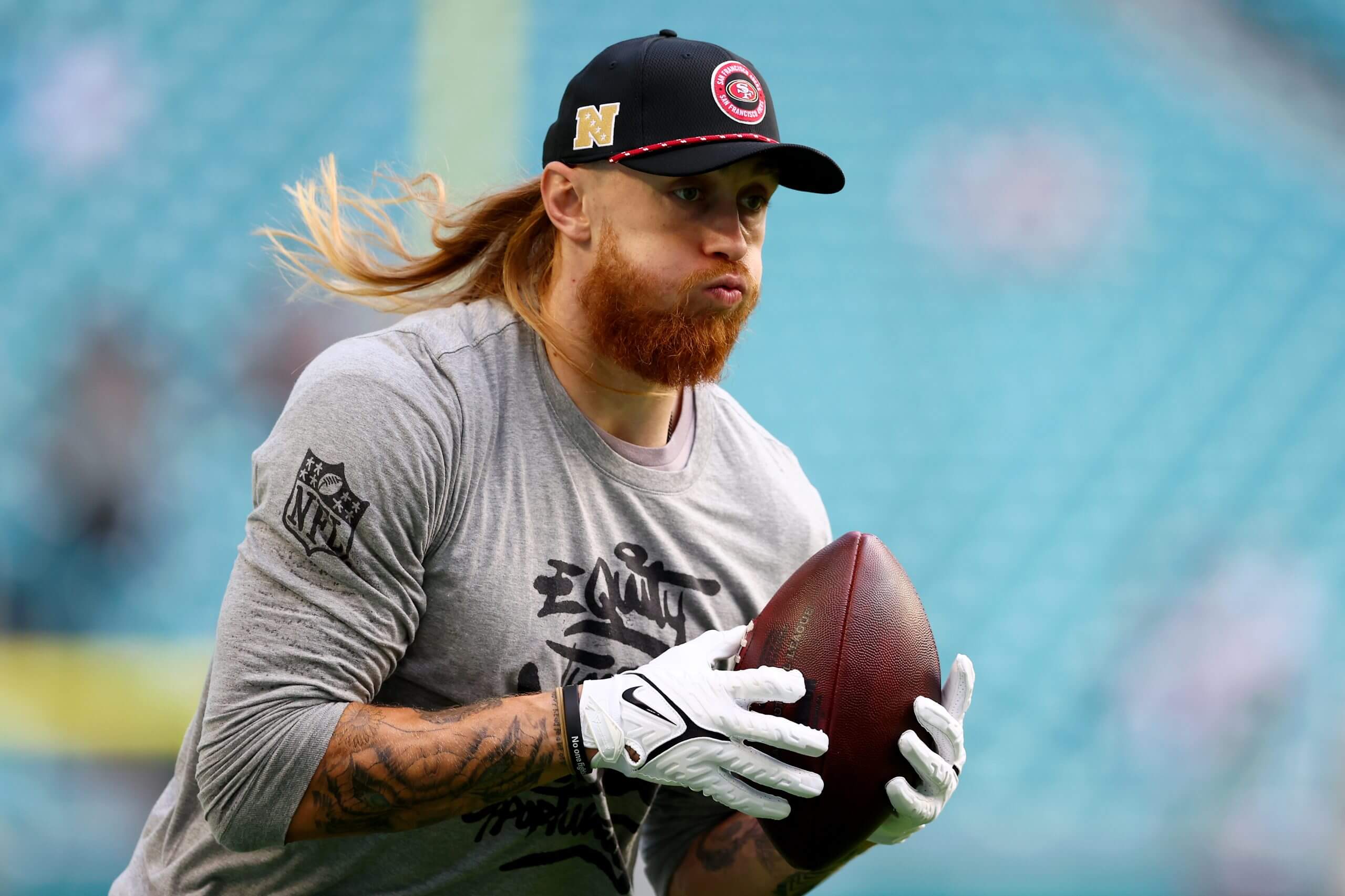 George Kittle of the San Francisco 49ers warms up before playing the Miami Dolphins at Hard Rock Stadium on December 22, 2024 in Miami Gardens, Florida.