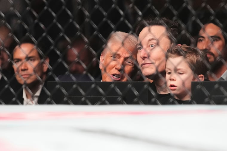 President Donald Trump, from foreground center to right, Elon Musk, his son X Æ A-Xii, and, in background at left, Secretary of State Marco Rubio attend a mixed martial arts fight at UFC 314, Saturday, April 12, 2025, in Miami.