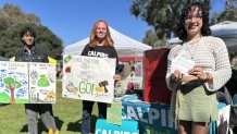 (left to right) Aryan Umesh, Koen Kuder, and Chloe Banaag at UC San Diego students who protested, Saturday, at the San Diego Earth Fest.
