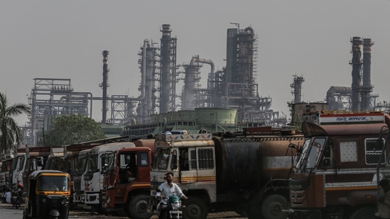 Oil tanker trucks outside an oil refinery operated by Bharat Petroleum Corp. Ltd., in Mumbai, India, on Friday, April 4, 2025. Indian refiners have rushed back to the market to seek crude supply after President Donald Trump's threat of more penalties against Russia raised concerns over potential disruptions to oil flows.(Bloomberg file)
