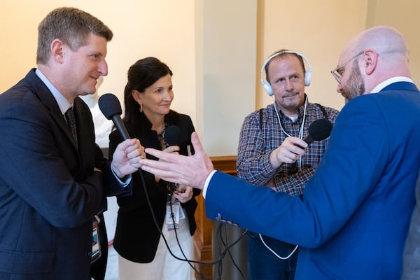 (Left to right) "Politically Georgia" podcast hosts Greg Bluestein and Patricia Murphy and producer Shane Backler interview State Sen. Josh McLaurin, D-Sandy Springs, at the Capitol in Atlanta on Monday.