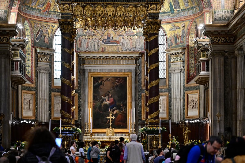 People pictured in Santa Maria Maggiore Basilica (the Basilica of Saint Mary Major) following the death of Pope Francis. Photo: Getty Images