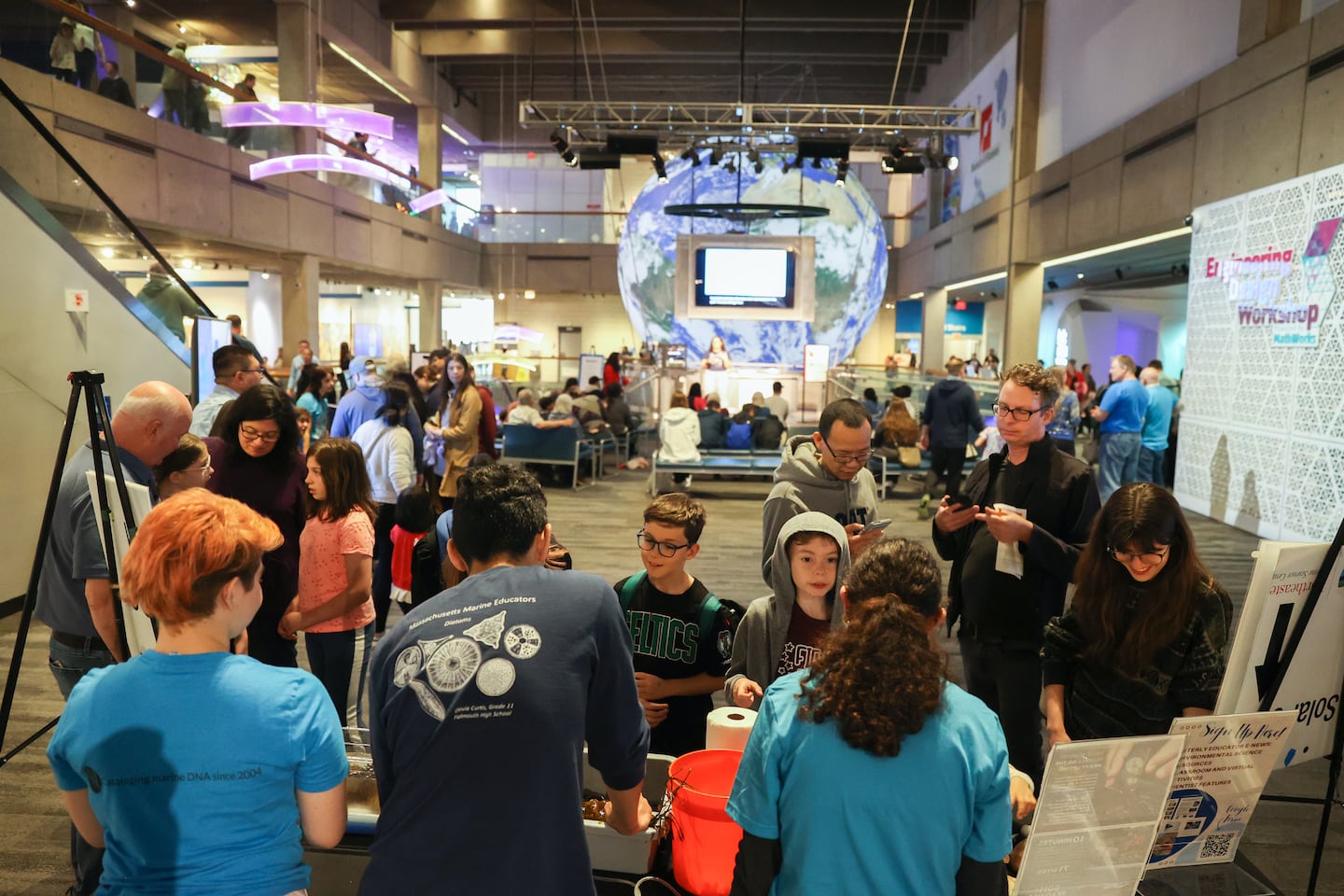 Some of the crowd that were at Rise Up Boston Climate Event at the Museum of Science.