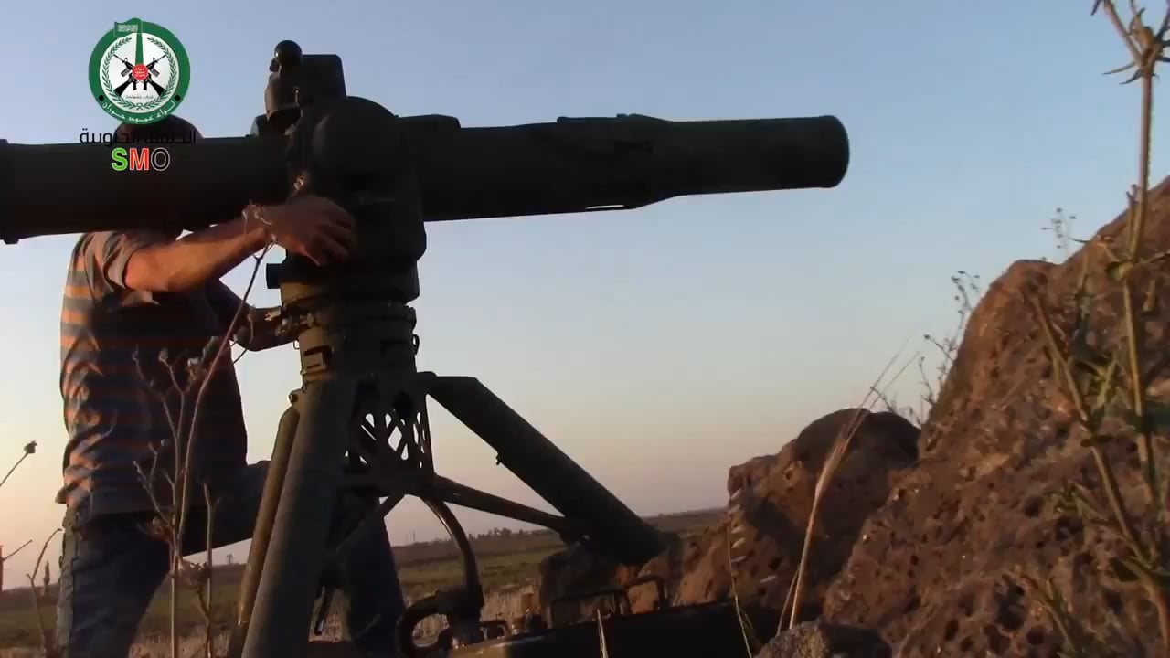 FSA BGM-71 TOW strike on an SAA tank at the Sawāqah Battalion base (Driving School base), east of Busr al-Harir, Daraa, Syria - 07/02/2014