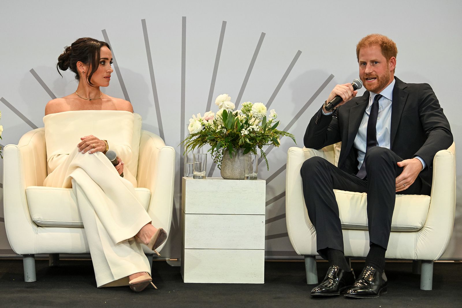 Image may contain Prince Harry Duke of Sussex Meghan Duchess of Sussex Blazer Clothing Coat and Jacket