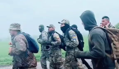 Ramp Descends: Colombian Veterans' Chant of Courage in Ukraine