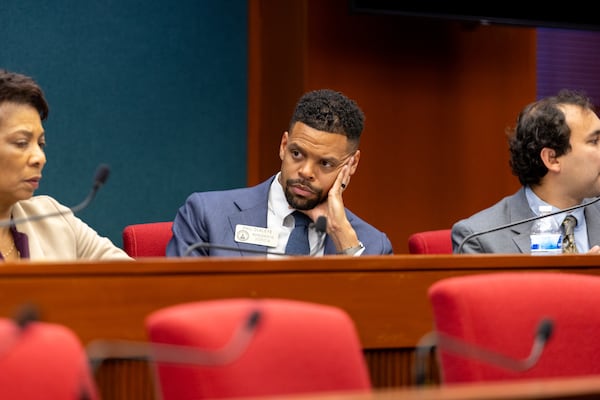 State Rep. Phil Olaleye, D-Atlanta, listens at a recent House Governmental Affairs Committee at the Paul D. Coverdell Legislative Office Building in Atlanta.