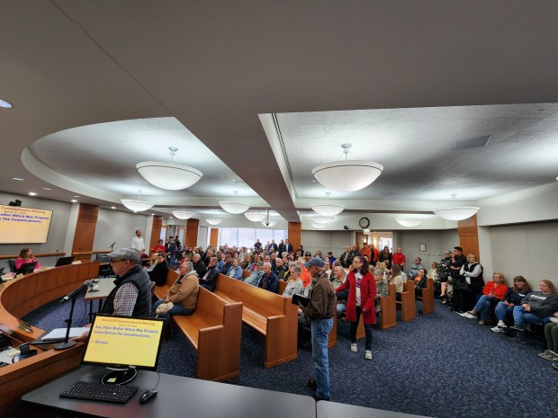 A crowd fills the seats in the Porter County Board of Commissioners chambers during a commissioners meeting Tuesday, April 1, 2025, to show displeasure with a proposal for a data center in Union Township. (Shelley Jones/for Post-Tribune)