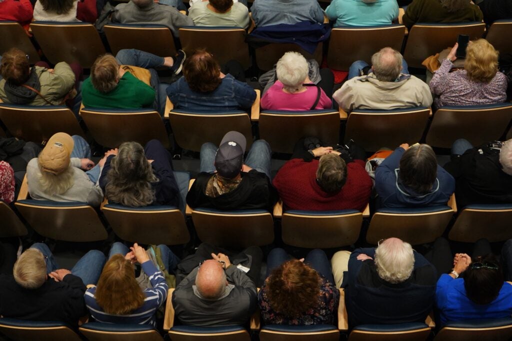 Attendees are seen overhead at U.S. Rep. Madeleine Dean's town hall in Blue Bell, Pennsylvania