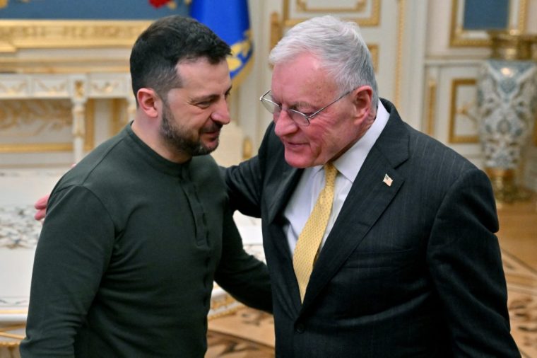 TOPSHOT - Ukraine's President Volodymyr Zelensky (L) greets US envoy Keith Kellogg at his offices in Kyiv on February 20, 2025, amid the Russian invasion of Ukraine. Zelensky meets with US envoy Kellogg after the US president branded the Ukrainian leader a "dictator" and said Russia "have the cards" in any talks to end the war. The United States has provided essential funding and arms to Ukraine, but the US president has rattled Kyiv and its European backers by opening talks with Moscow they fear could end the war on terms unacceptable to them. (Photo by Sergei SUPINSKY / AFP) (Photo by SERGEI SUPINSKY/AFP via Getty Images)