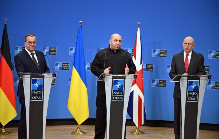 BRUSSELS, BELGIUM - APRIL 11: Ukrainian Defence Minister Rustem Umerov (C), German Defence Minister Boris Pistorius (L) and British Defence Minister John Healey (R) hold a joint press conference following the Meeting of The Ukraine Defence Contact Group at NATO headquarters during the NATO Defence Ministers' meeting in Brussels, Belgium on April 11, 2025. (Photo by Dursun Aydemir/Anadolu via Getty Images)