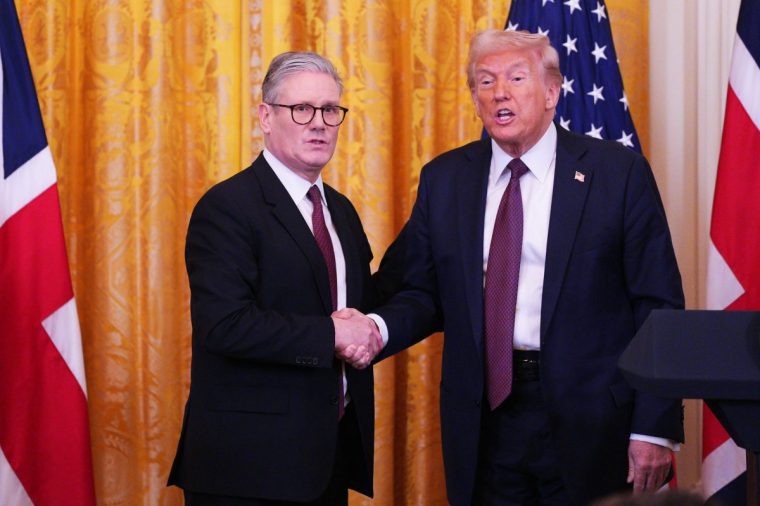 WASHINGTON, DC - FEBRUARY 27: (L-R) UK Prime Minister Keir Starmer and U.S. President Donald Trump shake hands at a joint press conference in the East Room at the White House on February 27, 2025 in Washington, DC. Starmer is on his first visit to Washington since President Trump returned to the White House. Starmer's trip comes shortly after he announced an increase in UK defense spending, ostensibly as a signal to Trump that the UK is prepared to bolster Europe's security, and as he aims to broker a fair peace deal for Ukraine amid Trump's warming relations with Russia. (Photo by Carl Court - Pool/Getty Images)
