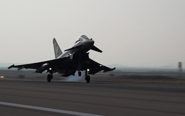 ANKARA, TURKIYE - DECEMBER 18: (----EDITORIAL USE ONLY - MANDATORY CREDIT - DEFENSE MINISTRY OF TURKIYE / HANDOUT' - NO MARKETING NO ADVERTISING CAMPAIGNS - DISTRIBUTED AS A SERVICE TO CLIENTS----) Eurofighter Typhoon jet from the UK's Royal Air Force lands at Murted Air Base in Ankara for inspection by Turkish officials on December 18, 2024. Two Eurofighter jets, which recently participated in a drill in Qatar, arrived in Ankara for inspection by Turkish officials due to potential purchase. (Photo by Turkish Defense Ministry / Handout/Anadolu via Getty Images)