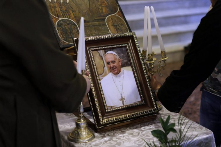 Christian worshippers attend a memorial mass for the late Pope Francis at the Melkite Greek Catholic Cathedral of St Elias in Israel's northern city of Haifa on April 24, 2025. (Photo by Jalaa MAREY / AFP) (Photo by JALAA MAREY/AFP via Getty Images)