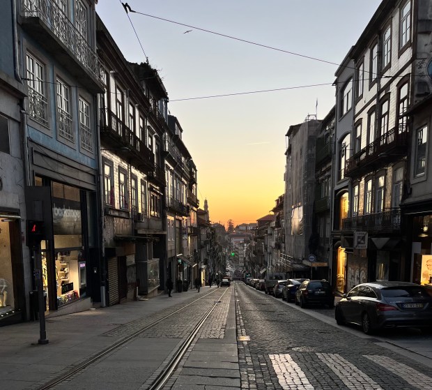 Sun setting at the end of a European street