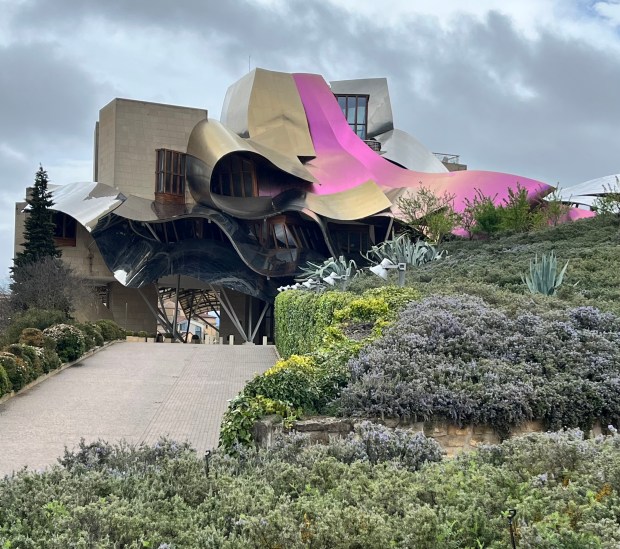 An ornate gold and pink building