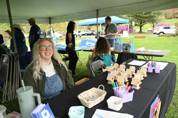 Camille Dantone, director of education at the Everhart Museum, provides...