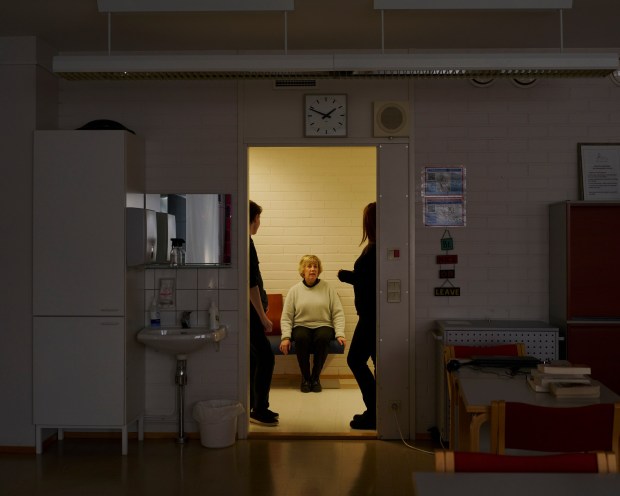 Nina Hansen, a high school English teacher, with student at Karleby Svenska Gymnasium in Kokkola, Finland on Feb. 22, 2023. ​​Hansen questioned the use of the word "happy" to encapsulate the Finnish mind-set. (Jake Michaels/The New York Times)