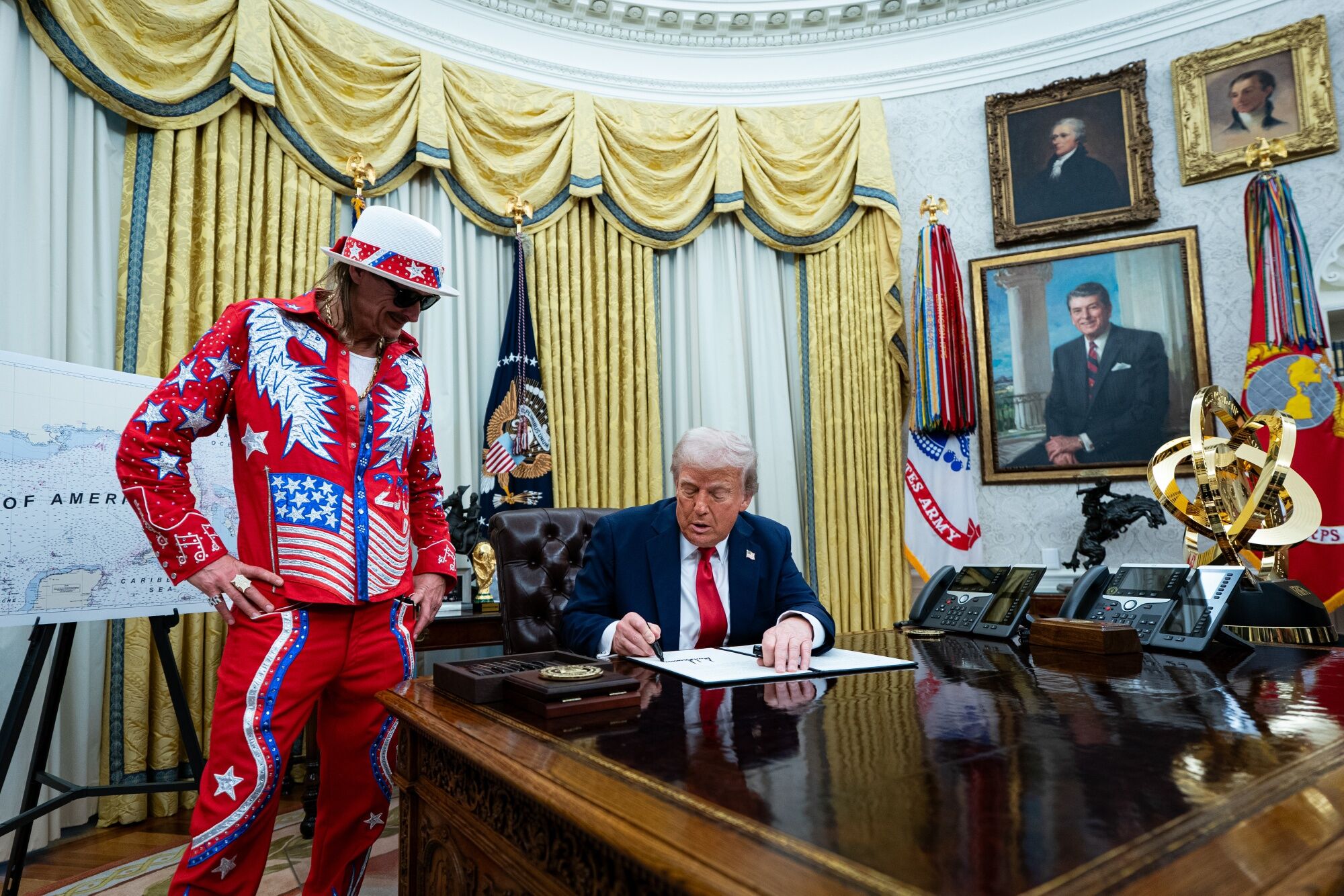 President Trump likes generous displays of gold in the Oval Office, just as he has for years at his club in Florida and his apartment in New York City. Photo: Bloomberg
