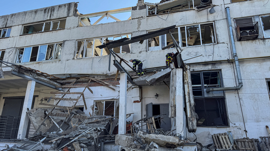 Rescuers work at the site where a bakery was hit by a Russian drone strike, amid Russia's attack on Ukraine, in Sumy, Ukraine April 18, 2025.(REUTERS)