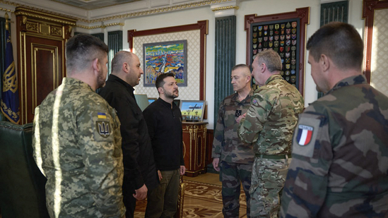 Ukrainian President Volodymyr Zelensky (3-L), Minister of Defence of Ukraine Rustem Umierov (2-L), meet with French Chief of the Defence Staff General Thierry Burkhard (3-R) and British Chief of the Defence Staff Admiral Tony Radakin (2-R) in Kyiv, amid the Russian invasion of Ukraine. (AFP/ Ukraine Presidential Press)