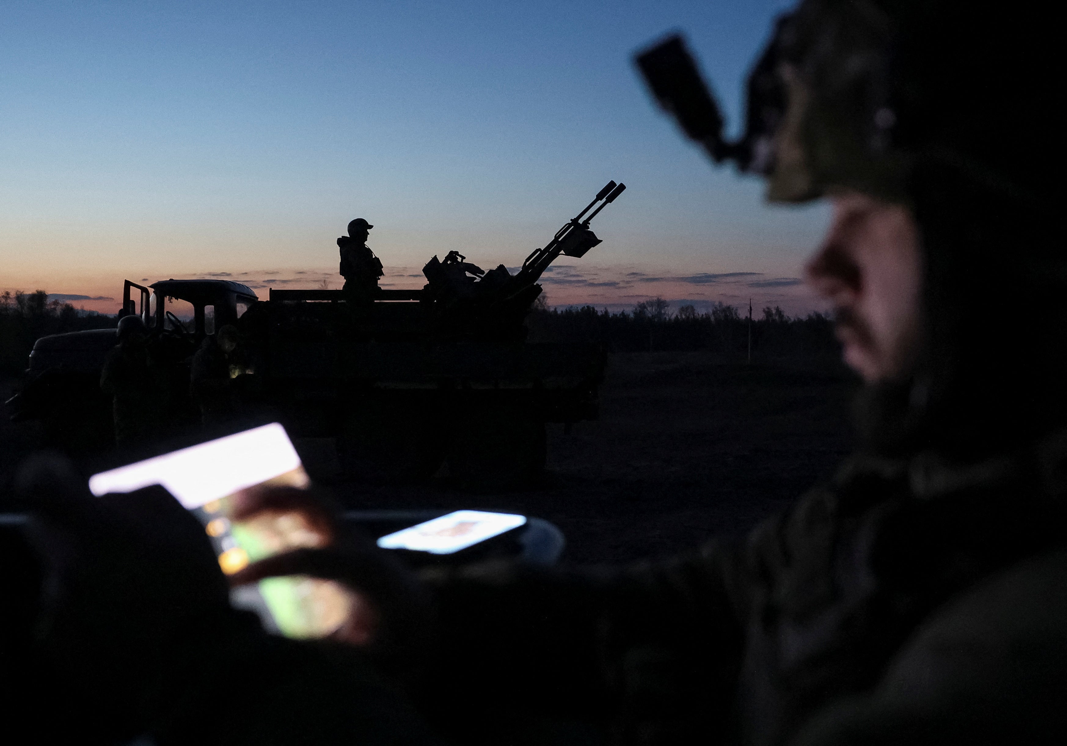Servicemen from a Ukrainian anti-drone mobile air defence unit hold their positions in the Donetsk region