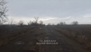 Russian soldier riding a dirt bike gets injured by a FPV hitting the ground next to him.