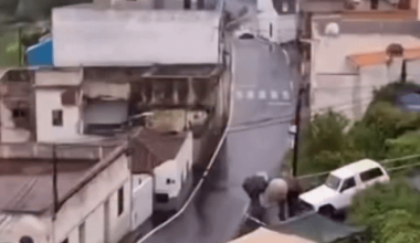 French car vs Spanish building