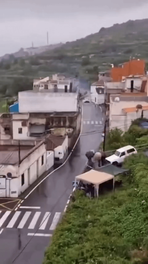 French car vs Spanish building